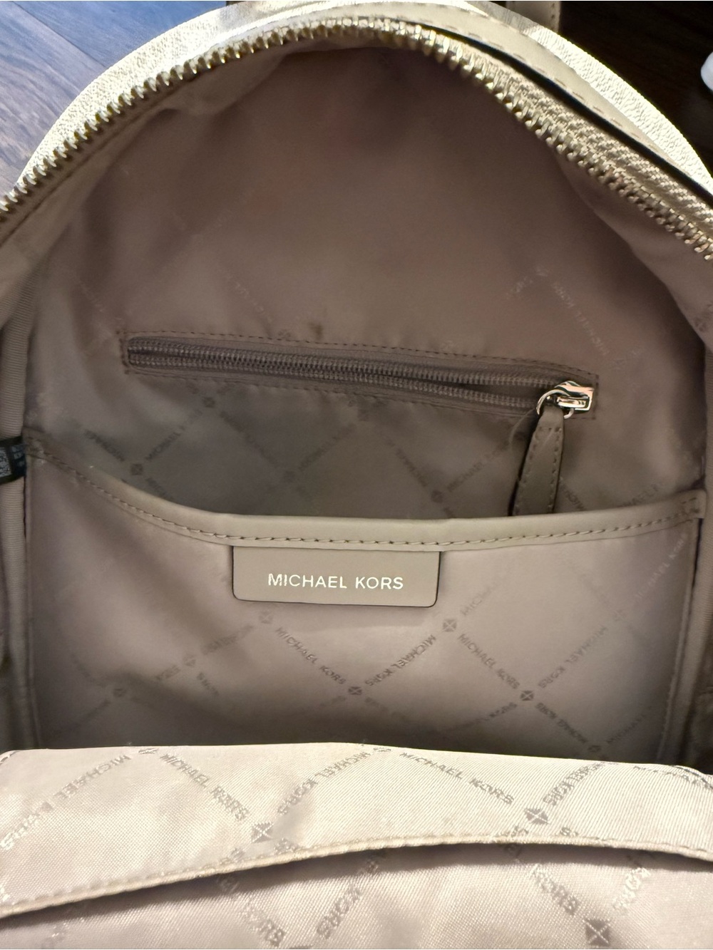Michael Kors White and Taupe Logo Dome Crossbody Backpack - Picture 7 of 12